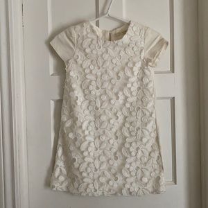 Pretty cotton dress with appliqué detail.
